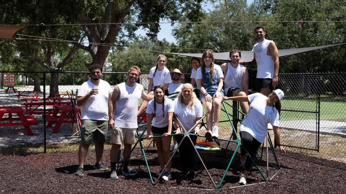 Life Surge employees volunteering at Inspiration Academy in Bradenton, Florida, preparing classrooms and campus for the 2025–2026 school year