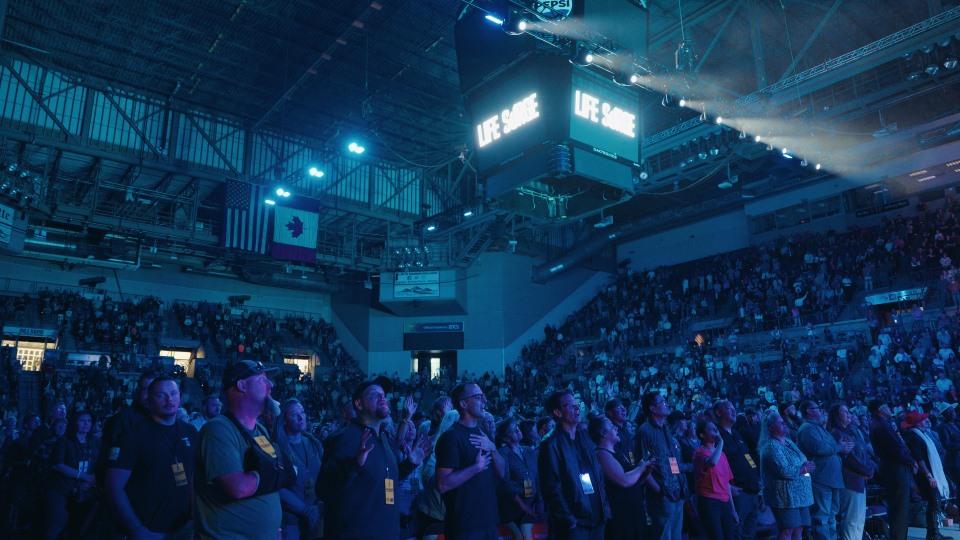 Arena of people in Colorado Springs at a Life Surge event