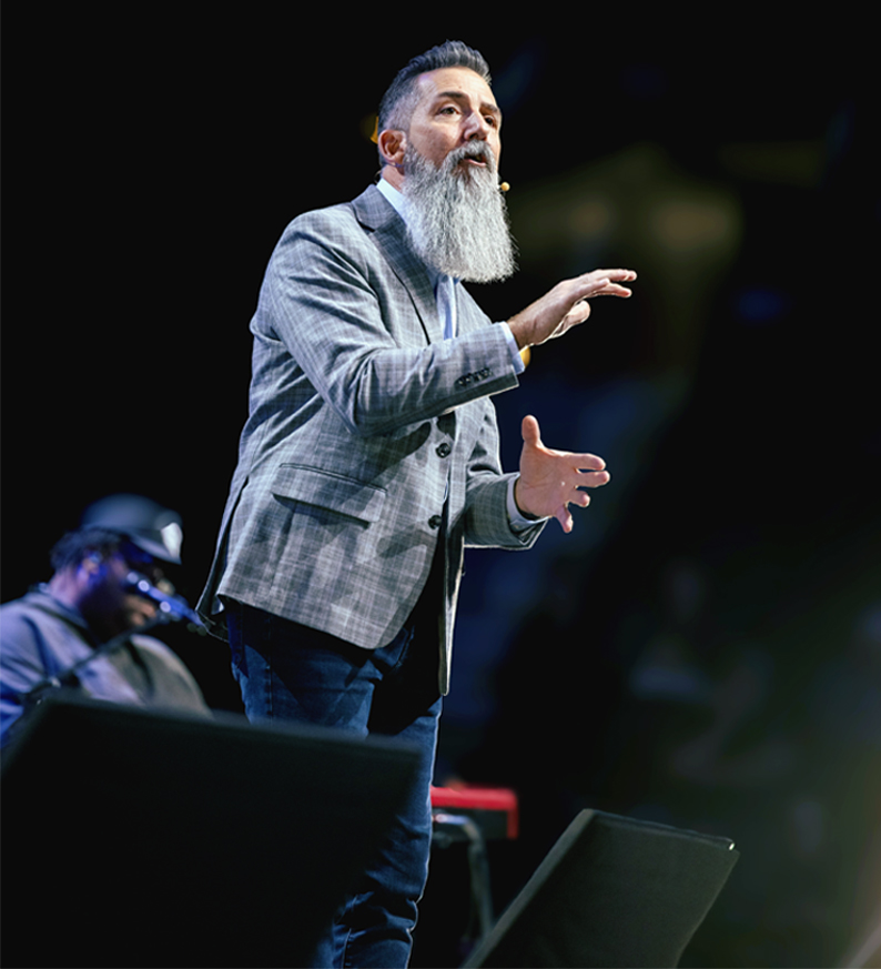 Shawn Marcell, President of Life Surge, speaking on stage at a past event. Photo courtesy of Life Surge.